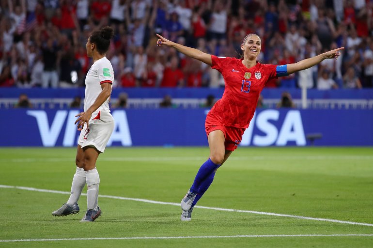 Alex Morgan of the USA celebrates after scoring her team's second goal during the 2019 FIFA Women's World Cup France Semifinal match between England and USA at Stade de Lyon on July 2, 2019. (Credit: Richard Heathcote/Getty Images)