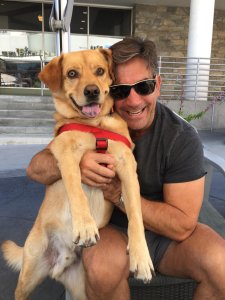 Gabriel Crispo, 49, is seen with his dog in an undated photo provided to KTLA by friends.