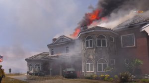 A home is seen burning in Chino Hills on July 28, 2019, as the Star Fire burned through at least 80 acres. (Credit: RMG News)