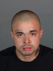 Jose Abel Iribe is seen in this LAPD booking photo.