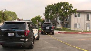 Newport Beach police respond to the scene of a reported domestic disturbance that led to an alleged assault on officers, shooting and standoff on July 7, 2019. (Credit: KTLA)