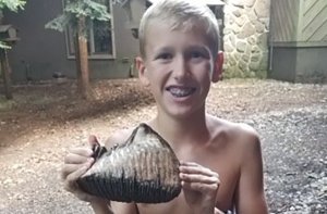 Jackson Hepner holds his discovery. (Credit: The Inn at Honey Run)