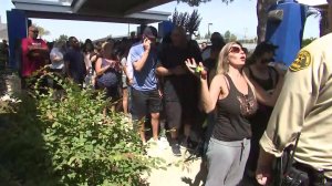 Parents waited outside as deputies searched San Dimas High School following a report of an armed person on campus. (Credit: KTLA)