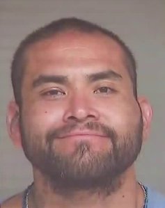 Zachary Castaneda, 33, is seen a mugshot during a police news conference on Aug, 8, 2019. (Credit: KTLA)