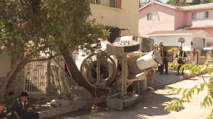 A cement truck smashed through the front of a home in L.A.'s Mt. Washington neighborhood on Aug. 31, 2019. No injuries were reported. (Credit: KTLA)