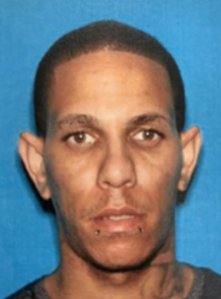 Robert Carrasquillo is seen in this booking photo from the Los Angeles Police Department.