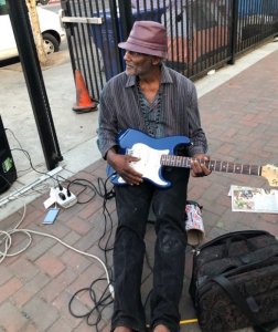 Dwayne Fields strums his guitar in an undated photo. (Credit: Los Angeles Times)