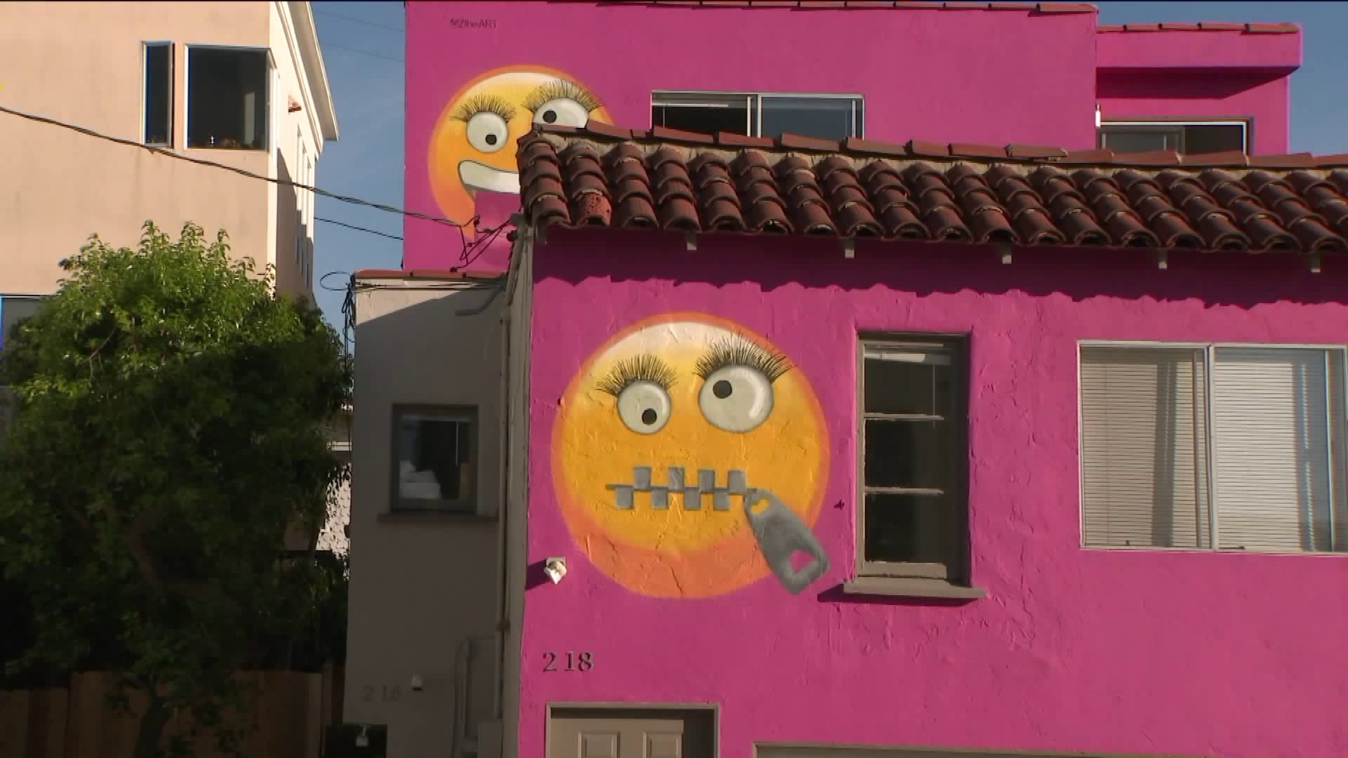 A duplex painted pink and adorned with emojis, pictured on Aug. 2, 2019, is at the center of a neighborhood controversy in Manhattan Beach.