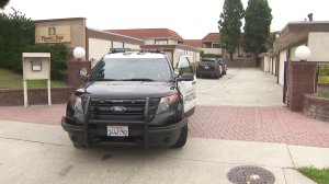 Garden Grove police on Aug. 7, 2019 investigate the death of a woman found inside a home. (Credit: KTLA)