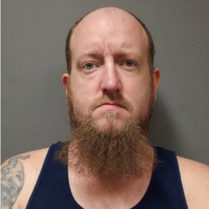 Kristoffer Dallas Buck is seen in this booking photo from the Fontana Police Department.