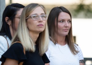 Alleged victims Annie Farmer, left, and Courtney Wild, right, leave the courthouse after a bail hearing in Jeffrey Epstein's sex trafficking case on July 15, 2019 in New York City. (Credit: JOHANNES EISELE/AFP/Getty Images)
