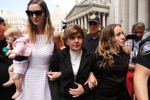 Attorney Gloria Allred, center, leaves a New York City courthouse on Aug. 27, 2019, with two women, a woman who did not wish to be identified, left, and Teala Davies, right, who have accused Jeffrey Epstein of sexually assaulting them. (Credit: Spencer Platt / Getty Images)