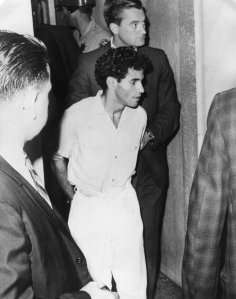 Sirhan Sirhan is taken into custody following the fatal shooting of Sen. Robert F. Kennedy at the Ambassador Hotel during a campaign stop in Los Angeles in June 1968. (Credit: Keystone / Getty Images)