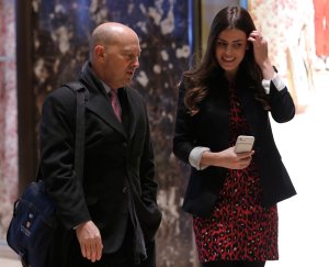 Retired Admiral James Stavridis, left, dean of Fletcher School at Tufts University, is escorted by Madeleine Westerhout as he arrives at Trump Tower in New York City on Dec. 8, 2016. (Credit: Dominick Reuter / AFP / Getty Images)