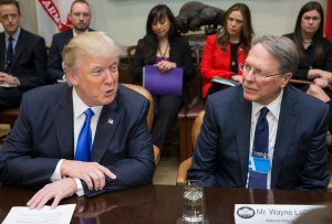 President Donald Trump sits beside CEO of the National Rifle Association Wayne LaPierre, during a meeting on Trump's nomination of Neil Gorsuch to the Supreme Court in the Roosevelt Room of the White House on Feb. 1, 2017. (Credit: Michael Reynolds - Pool/Getty Images)