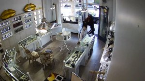 A still from surveillance video taken on Aug. 15, 2019 shows the owner of heist jewelry thwarting a robbery. 