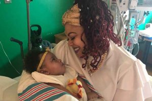 Monique Goldring holds her daughter, Phoenix, in the hospital, in this photo obtained by CNN.