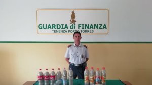 14 bottles containing around 40 kilograms of sand are seen after being seized by police in this photo obtained by CNN.