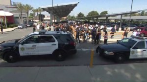 Sheriff's patrol vehicles could be seen on the San Dimas High School campus on Aug. 22, 2019. (Credit: KTLA)