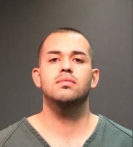 Jonathan Reyes is seen in this booking photo from the Santa Ana Police Department.
