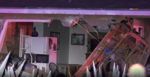 A gaping hole can be seen in a home in Beaumont after firefighetrs pulled out a pickup truck that crashed into it on August 3, 2019. (Credit: RMG News)