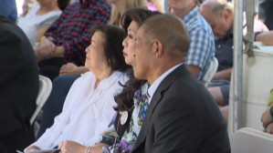 Ileto's family listen to a speaker on Aug. 10, 2019, during the 20th anniversary of Joseph Ileto's killing and a shooting at a Granada Hills jewish center. (Credit: KTLA)