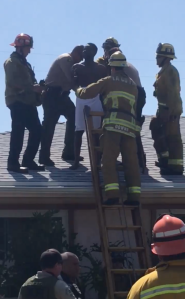 A nude burglary suspect was found hiding in the chimney of a Ladera Heights home on Aug. 11, 2019. (Credit: Ace Antonio Hall)