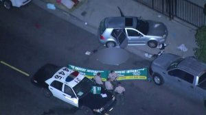 Deputies respond to investigate a fatal shooting in South Los Angeles on Aug. 14, 2019. (Credit: KTLA)