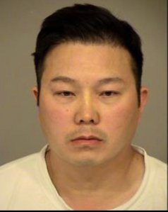Peter Nhan is seen in this booking photo from the Simi Valley Police Department.