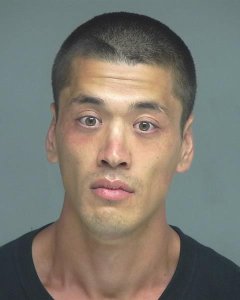 Jonathan M. Warner is seen in this booking photo from the Garden Grove Police Department.