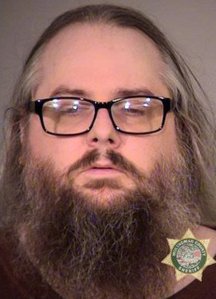 Andrew Franklin Kowalczyk is seen in a booking photo.
