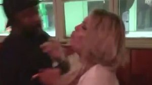 This still from footage shows a transgender woman being grabbed and escorted out of Las Perlas in downtown L.A. on Aug. 23, 2019. (Credit: Khloe Perez-Rios)