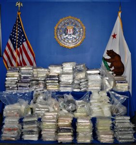 Hundreds of pounds of narcotics seized as part of a federal investigation into drug trafficking are seen in this photo released by the U.S. Department of Justice on Sept. 5, 2019. 