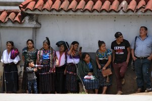Guatemalan migrants deported from the U.S. remain outside the Air Force Base after their arrival in Guatemala City on July 31, 2019. (Credit: ORLANDO ESTRADA/AFP/Getty Images)