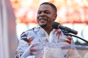 Artist Kehinde Wiley speaks at the unveiling of his new work “Rumors of War” as it is unveiled in Times Square on September 27, 2019 in New York City. (Credit: Spencer Platt/Getty Images)