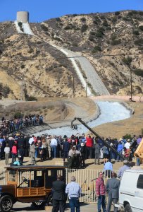 A crowd gathers in Sylmar on the 100th anniversary of the opening of the Los Angeles Aqueduct gates opening, on Nov. 5, 2013.(Credit: Frederic J. Brown/AFP/Getty Images)