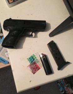 A handgun and suspected narcotics are seen in this photo from the Ventura County Sheriff's Office.