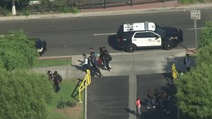 Los Angeles County Sheriff's vehicles remained at Paramount High School hours after a fight broke out on campus on Sept. 20, 2019. (Credit: KTLA)