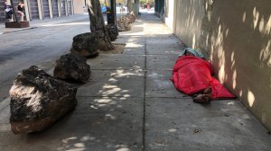 Neighbors organized efforts to use boulders to stop the homeless from pitching tents on their sidewalks. (Credit: Dan Simon/CNN)