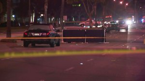 Police investigate the death of a man in Santa Fe Springs on Sept. 18, 2019.