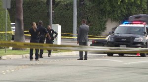 Police investigate the scene of a shooting in the area of Duarte Road and San Gabriel Boulevard in San Marino on Sept. 22, 2019. (Credit: KTLA)