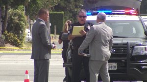 Police investigate the scene of a shooting in the area of Duarte Road and San Gabriel Boulevard in San Marino on Sept. 22, 2019. (Credit: KTLA)