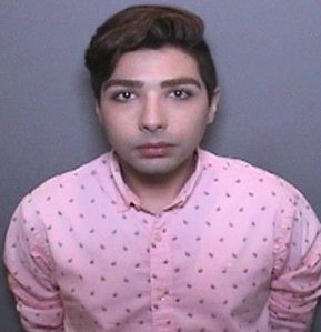 Ariya Ouskouian, 23, is seen in a booking photo released Aug. 29, 2018, by the Orange Police Department.