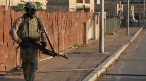 A photo posted to a U.S. military social media account depicts U.S. Army Spc. Adrian Bonar on patrol in Akashat, Iraq in late-2007.