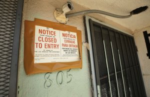 A city notice is posted on the illegally converted church building in the 800 block of West 57th Street.(Credit: Al Seib / Los Angeles Times)