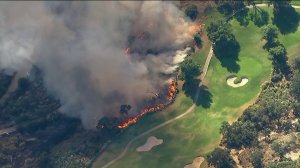 The Getty Fire burns near the Mountain Gate Golf Course on Oct. 28, 2019. (Credit: KTLA)