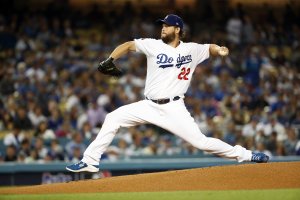 Clayton Kershaw of the Los Angeles Dodgers pitches against the Washington Nationals in the first inning of Game 2 of the National League Division Series at Dodger Stadium on Oct. 4, 2019. (Credit: Sean M. Haffey / Getty Images)