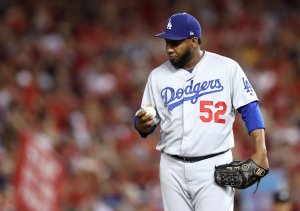 Pedro Baez of the Los Angeles Dodgers reacts after giving up a three-run home run to Ryan Zimmerman of the Washington Nationals in the fifth inning of Game 4 of the National League Division Series at Nationals Park in Washington, D.C., on Oct. 7, 2019. (Credit: Rob Carr / Getty Images)