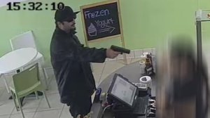 Police are seeking the gunman pictured in this photo in connection with a yogurt shop robbery in Garden Grove on Sept. 27, 2019. (Credit: Garden Grove Police Department)