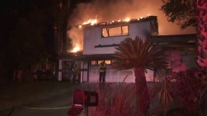 A home burns in the Hillside Fire on Oct. 31, 2019. (Credit: KTLA)